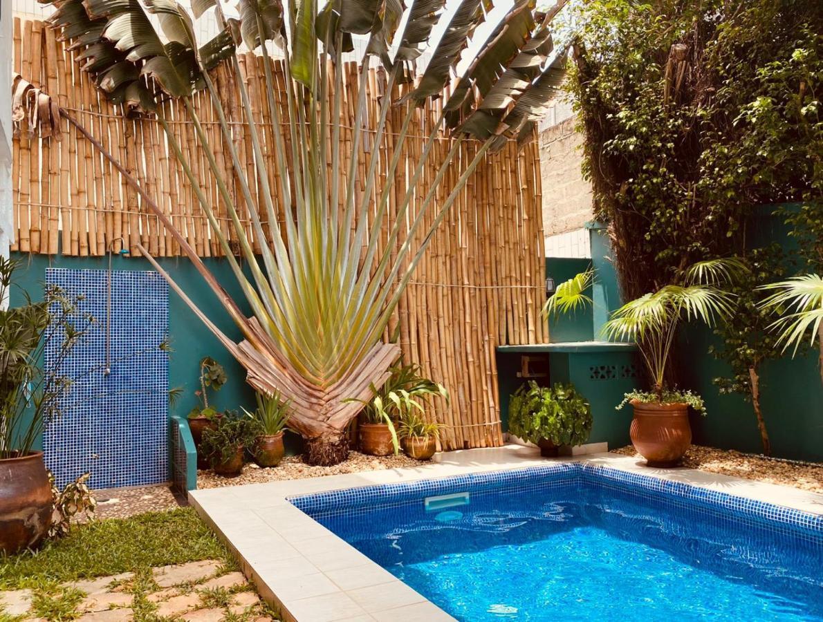 L'Oasis Guesthouse 코토누 외부 사진