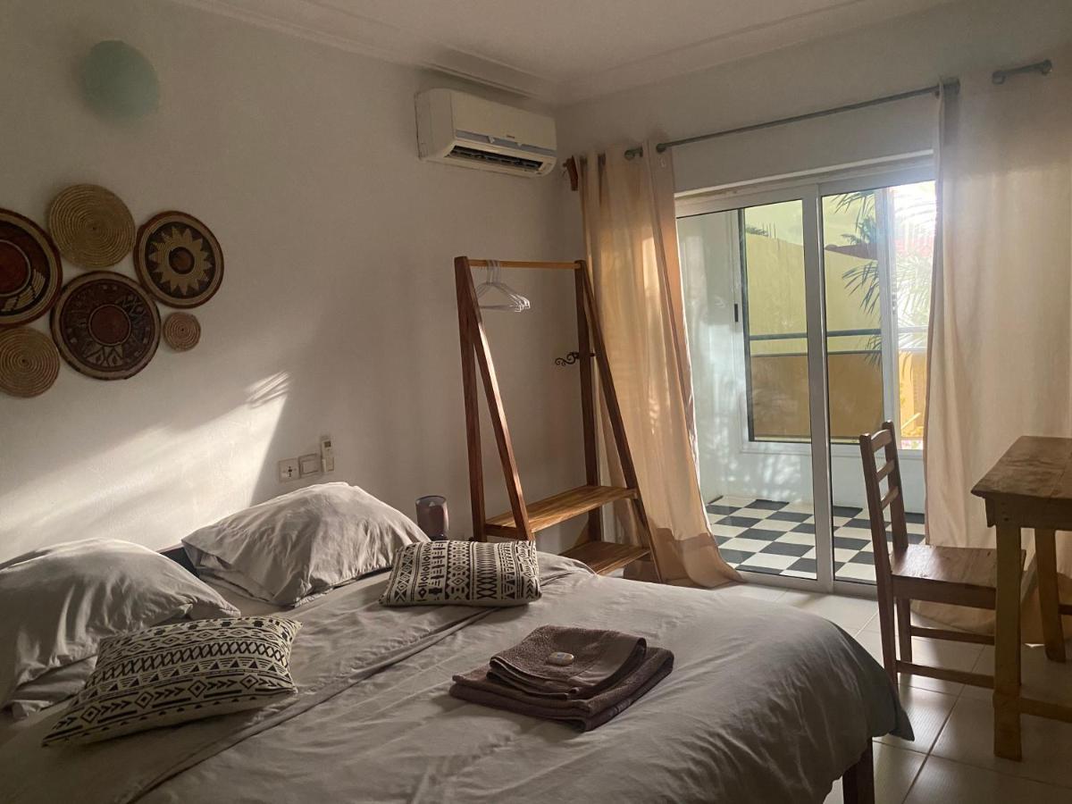 L'Oasis Guesthouse 코토누 외부 사진