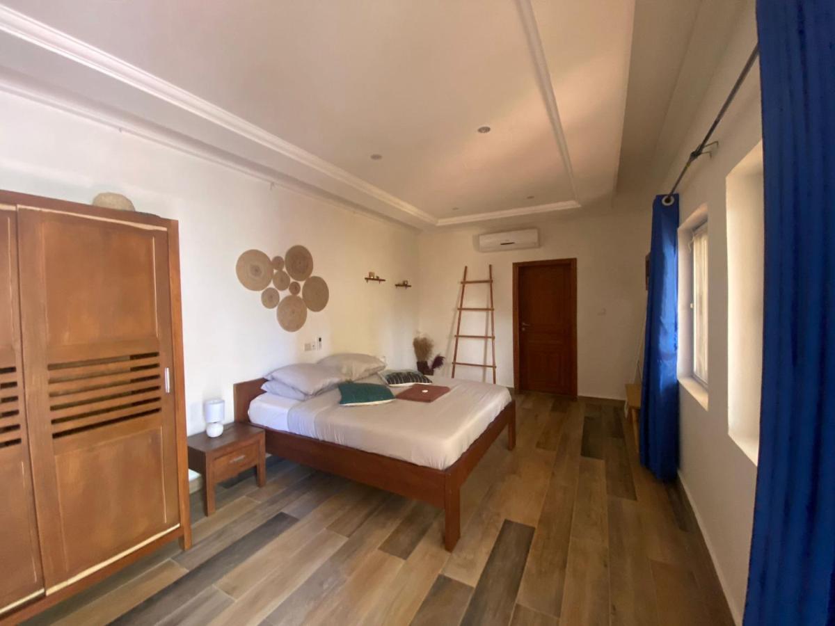 L'Oasis Guesthouse 코토누 외부 사진