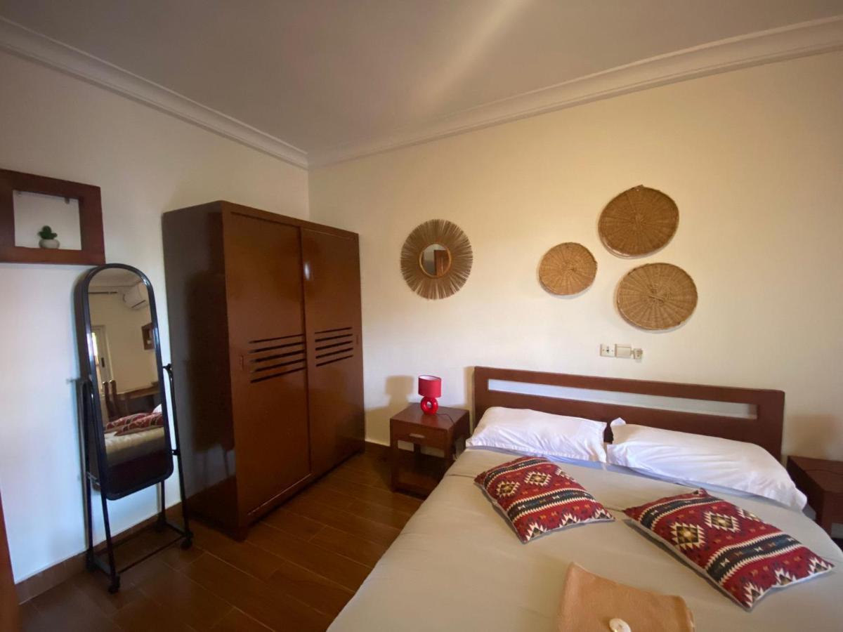 L'Oasis Guesthouse 코토누 외부 사진