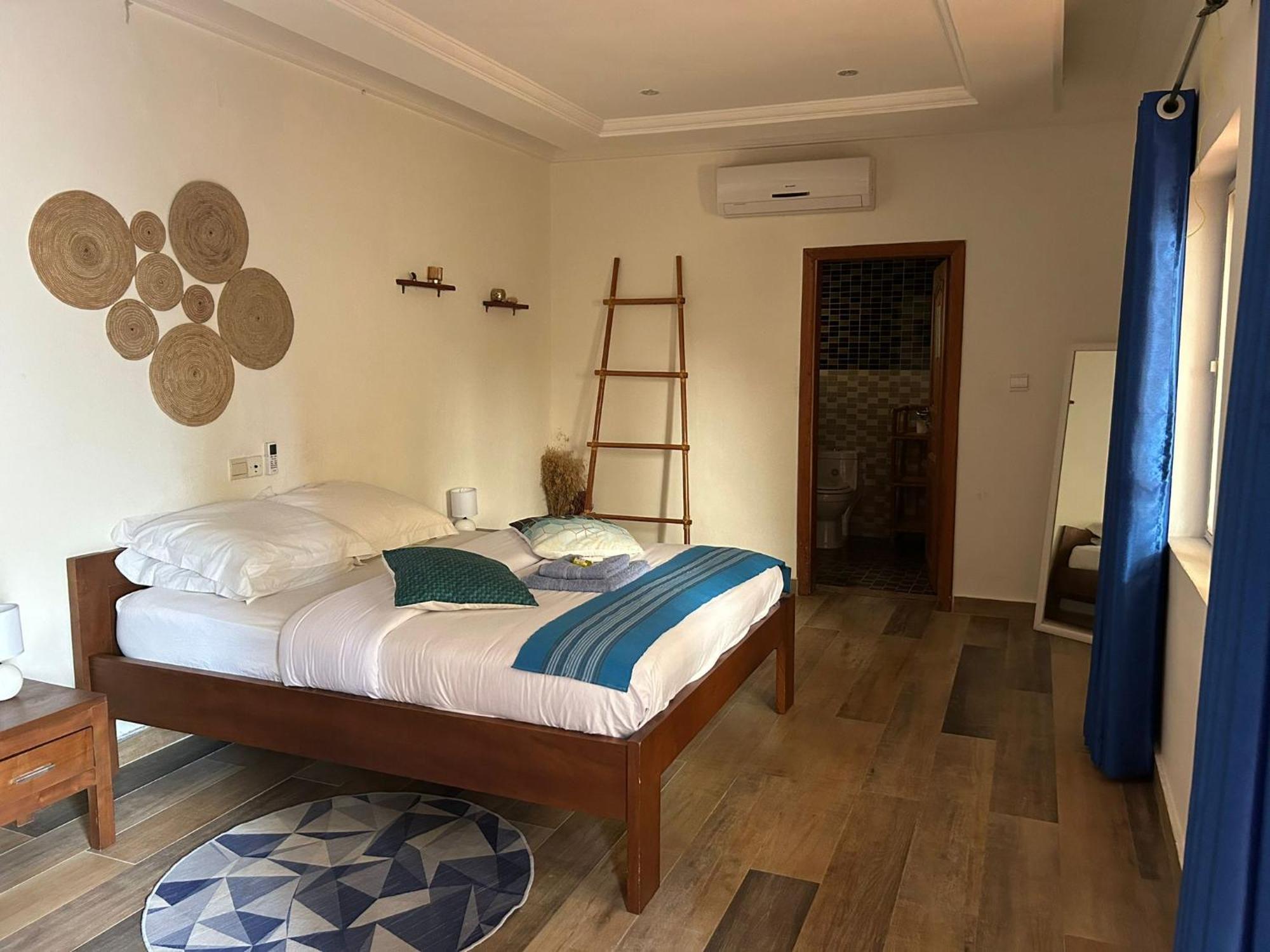 L'Oasis Guesthouse 코토누 외부 사진